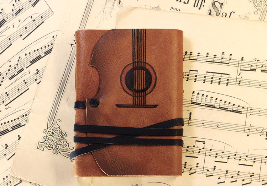 Music - leather journal with vintage style paper in orange brown
