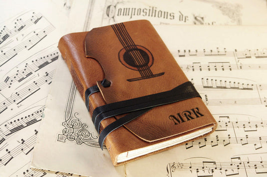 Music - leather journal with vintage style paper in orange brown